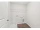A compact laundry room with essential hookups and space for laundry appliances at 639 Tigers Eye Ter, Kennesaw, GA 30144