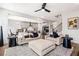 Bright and open living room featuring modern decor and seamless flow into the kitchen area at 639 Tigers Eye Ter, Kennesaw, GA 30144