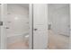 Bathroom featuring tile flooring, a tub/shower combo, toilet and light neutral paint at 151 Rolling Hills Pl, Canton, GA 30114