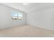 Bedroom painted a light neutral color featuring carpet and a large window with ample natural light at 151 Rolling Hills Pl, Canton, GA 30114