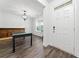 Bright entryway with wood floors, a chandelier, and a painted white front door at 151 Rolling Hills Pl, Canton, GA 30114