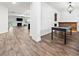 Open concept living area with fireplace, hardwood floors, and natural light at 151 Rolling Hills Pl, Canton, GA 30114