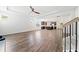 Expansive living room featuring hardwood floors, a staircase, and an open-concept design at 151 Rolling Hills Pl, Canton, GA 30114