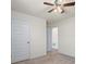 Bedroom featuring a ceiling fan, carpeted floor, and neutral wall paint at 2296 Waycross Ln, Dacula, GA 30019