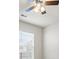 Close-up of a ceiling fan and natural light coming in through a window at 2296 Waycross Ln, Dacula, GA 30019