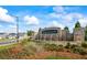 A scenic community entrance with a water feature and landscaping at 2296 Waycross Ln, Dacula, GA 30019