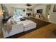 Spacious living room featuring modern decor, fireplace, and a comfortable sectional sofa at 3962 Chicamauga Ne Dr, Kennesaw, GA 30144