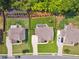 An aerial view showcases a home with a manicured lawn in a lovely neighborhood at 422 Silver Brook Dr, Woodstock, GA 30188