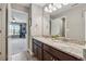 Bathroom with granite countertops and double sinks, with an adjoining room at 422 Silver Brook Dr, Woodstock, GA 30188