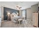 Inviting bedroom with neutral decor, ceiling fan, and stylish furnishings at 422 Silver Brook Dr, Woodstock, GA 30188