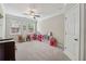 Spacious ' room with carpet, two large windows, a ceiling fan, and lots of space to play at 422 Silver Brook Dr, Woodstock, GA 30188