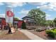 Exterior view of Reformation Brewery, showcasing its outdoor seating area, industrial design, and inviting ambiance at 422 Silver Brook Dr, Woodstock, GA 30188