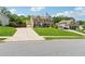 Beautiful two-story home with brick and siding exterior, attached two car garage, and manicured lawn at 422 Silver Brook Dr, Woodstock, GA 30188
