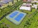 Aerial view of tennis courts at community recreational center with pool at 422 Silver Brook Dr, Woodstock, GA 30188