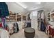 Well-organized walk-in closet with custom shelving and ample storage space at 422 Silver Brook Dr, Woodstock, GA 30188