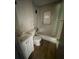 A functional bathroom featuring a white vanity, toilet, and a bathtub-shower combination at 50 Evelyn Rd, Covington, GA 30016