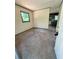Entryway showcases neutral walls, carpet flooring, and a door with modern hardware at 50 Evelyn Rd, Covington, GA 30016