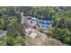 Aerial view of community amenities including pool, tennis courts, and playground at 10280 Medridge Cir, Johns Creek, GA 30022