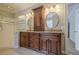 Bathroom featuring dual vanities, granite countertops, and a walk-in shower at 10280 Medridge Cir, Johns Creek, GA 30022