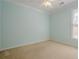 Cozy bedroom with neutral walls and plush carpet at 10280 Medridge Cir, Johns Creek, GA 30022