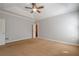 Bedroom with tray ceiling and carpet at 10280 Medridge Cir, Johns Creek, GA 30022