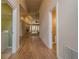Hallway view to the living room and bathroom at 10280 Medridge Cir, Johns Creek, GA 30022