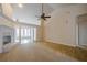 Living room with vaulted ceilings, fireplace, carpet and access to additional rooms at 10280 Medridge Cir, Johns Creek, GA 30022