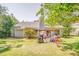 Spacious backyard with a pergola covered patio, perfect for outdoor entertaining and relaxation at 3288 Owens Meadow Ln, Kennesaw, GA 30152