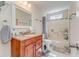 Well-maintained bathroom featuring a vanity with granite countertop and a shower-tub combination at 3288 Owens Meadow Ln, Kennesaw, GA 30152
