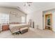 Vaulted ceiling bedroom featuring plush carpeting and natural light from two windows at 3288 Owens Meadow Ln, Kennesaw, GA 30152