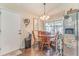 Cozy dining area featuring natural light and classic wooden furniture at 3288 Owens Meadow Ln, Kennesaw, GA 30152