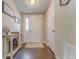 Welcoming entryway featuring hardwood floors, a console table and modern décor at 3288 Owens Meadow Ln, Kennesaw, GA 30152