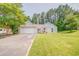 Charming single-story home featuring a well-maintained lawn and an attached two-car garage at 3288 Owens Meadow Ln, Kennesaw, GA 30152