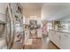 Bright kitchen with white cabinets and stainless steel appliances at 3288 Owens Meadow Ln, Kennesaw, GA 30152