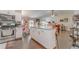 Spacious kitchen with an island featuring modern appliances and hardwood floors at 3288 Owens Meadow Ln, Kennesaw, GA 30152