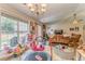 Spacious living room with a large window and play area at 3288 Owens Meadow Ln, Kennesaw, GA 30152
