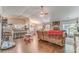 Spacious living room featuring vaulted ceilings, hardwood floors, open layout to kitchen and dining area at 3288 Owens Meadow Ln, Kennesaw, GA 30152