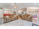 Open-concept living room featuring hardwood floors and neutral-toned sofas at 3288 Owens Meadow Ln, Kennesaw, GA 30152