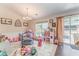 Bright playroom with natural light, filled with toys and room to play at 3288 Owens Meadow Ln, Kennesaw, GA 30152