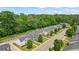 Aerial view of a neighborhood of townhomes, showing the layout and proximity to green spaces at 5880 Garden Circle Cir, Douglasville, GA 30135