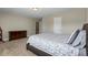 Spacious bedroom with neutral color palette and large bed at 5880 Garden Circle Cir, Douglasville, GA 30135