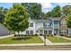 Charming two-story home boasts manicured lawn, tidy shrubbery, and a welcoming facade at 5880 Garden Circle Cir, Douglasville, GA 30135