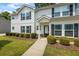 Beautiful front lawn and sidewalk leading up to the front door of the two story home at 5880 Garden Circle Cir, Douglasville, GA 30135