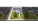 Aerial view of a two-story townhome with landscaped yard, sidewalks, and inviting curb appeal at 5880 Garden Circle Cir, Douglasville, GA 30135