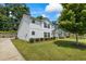 Charming two-story townhome with landscaped yard and inviting curb appeal at 5880 Garden Circle Cir, Douglasville, GA 30135