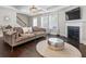 Bright living room with hardwood floors, fireplace, and coffered ceilings at 5880 Garden Circle Cir, Douglasville, GA 30135