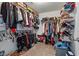 Large walk-in closet with ample storage space and organized shelving at 5880 Garden Circle Cir, Douglasville, GA 30135