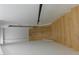 Spacious basement featuring light walls, wooden flooring and wall features at 9148 Homewood Dr, Riverdale, GA 30274