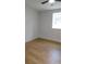 Bright bedroom with neutral walls, light-colored flooring, and natural light from a window at 9148 Homewood Dr, Riverdale, GA 30274