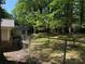 Large, private backyard with mature trees and plenty of room to relax at 1268 Woodland Ne Rd, Conyers, GA 30012